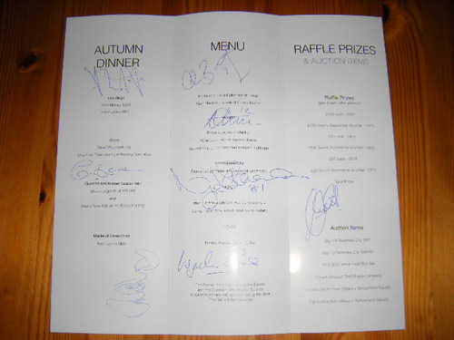 An autographed restaurant menu